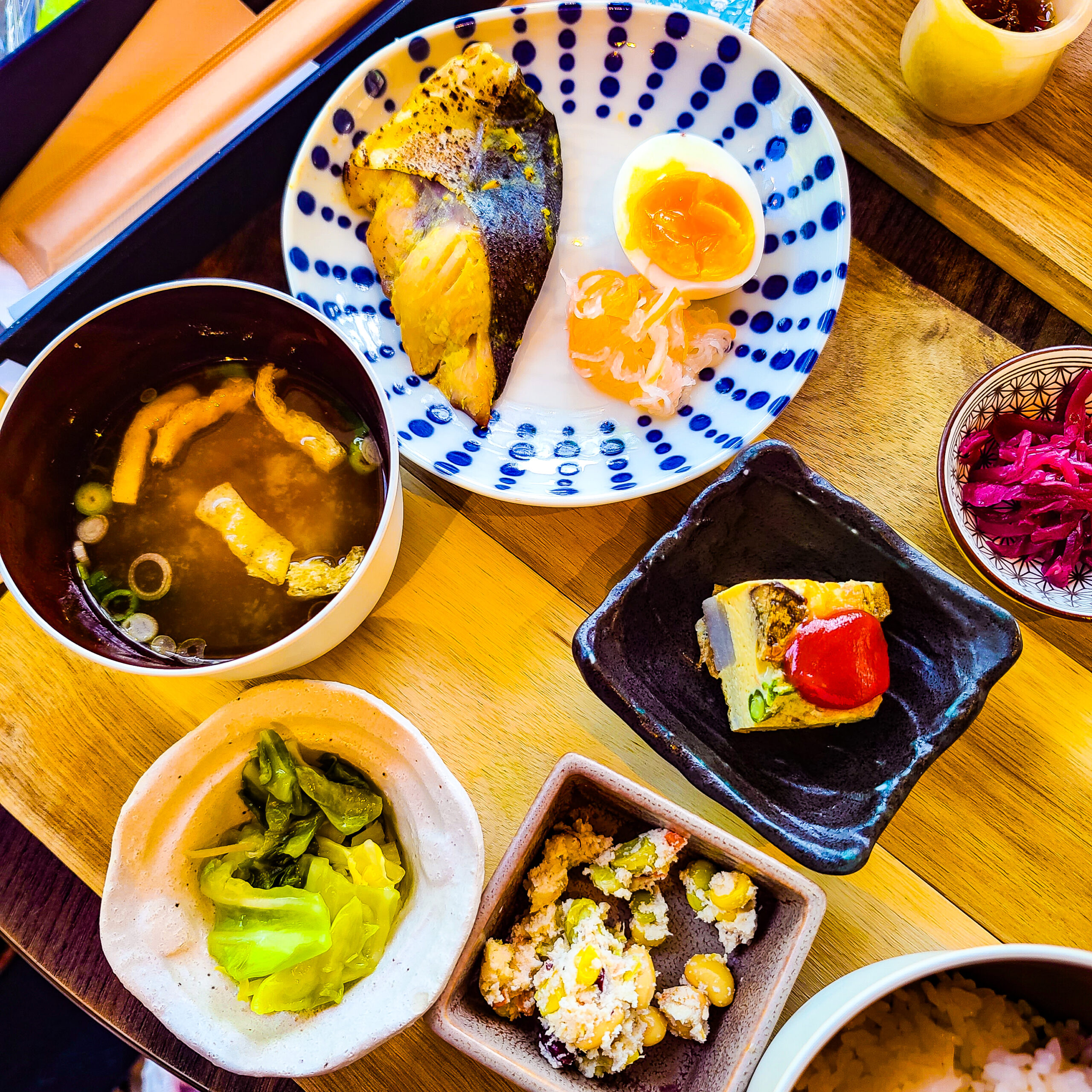 Small bowls and dishes of Japanese cuisine.